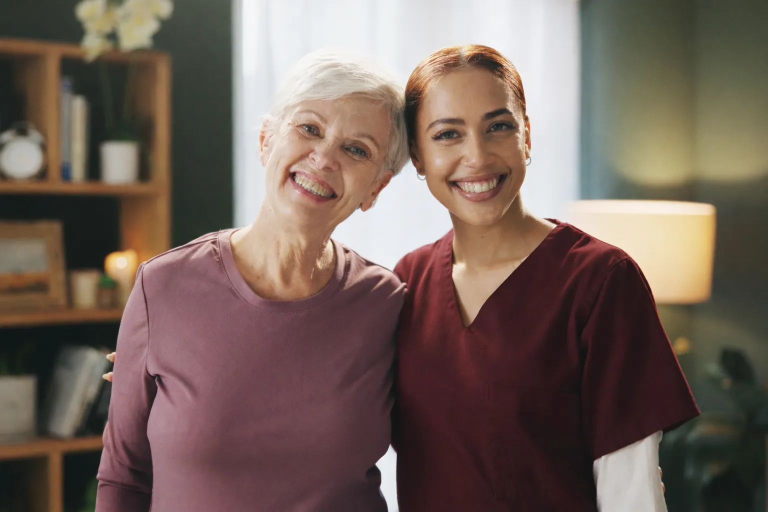 Companion Home Care in Bellevue Companion caregiver in Bellevue WA sharing conversation and tea with senior at home, providing emotional and daily support